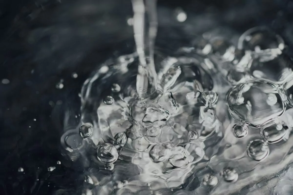 water droplets on body of water
