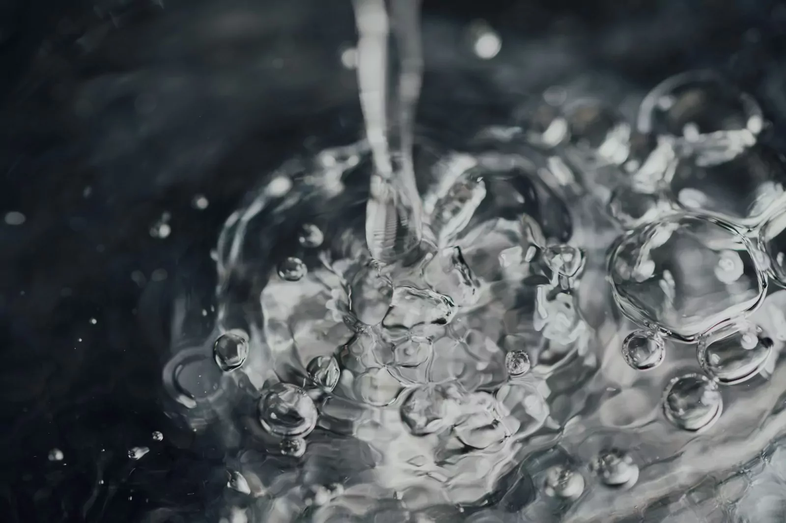 water droplets on body of water